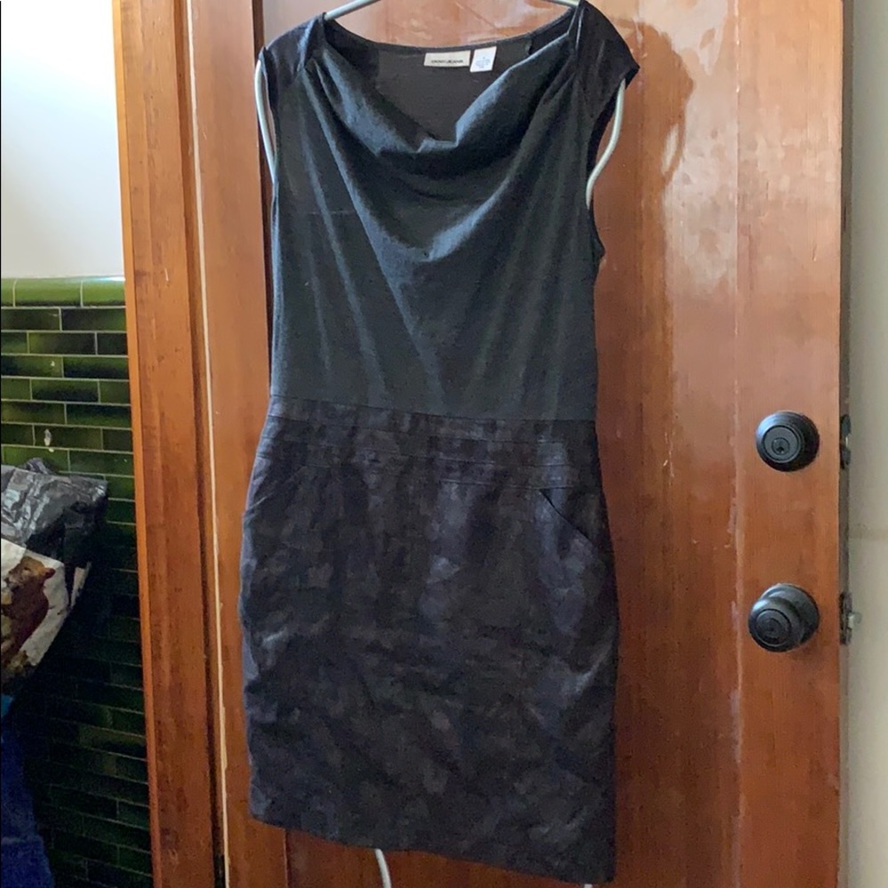 Black dress goes well with long or short boots